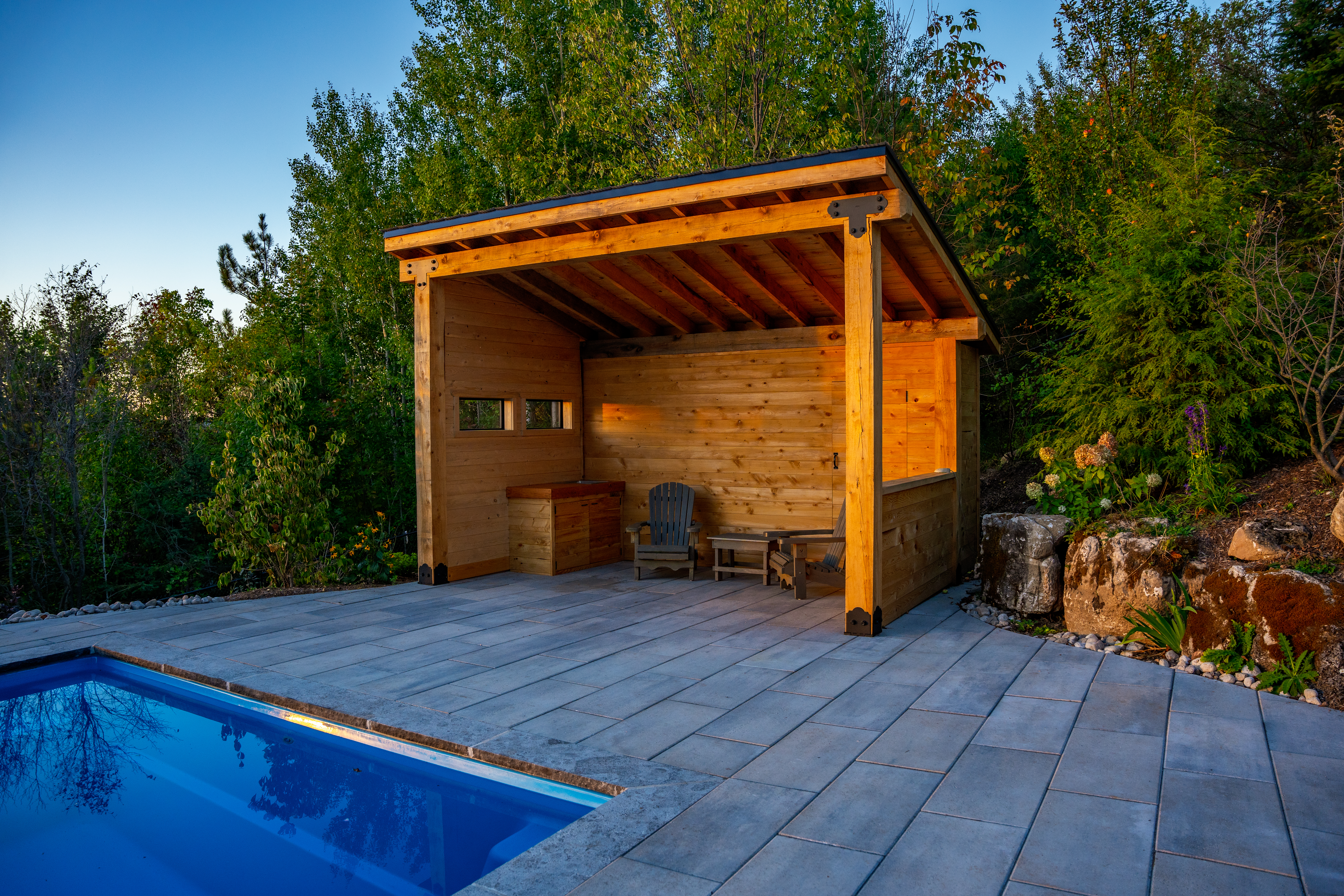Dickason project timber pavilion beside a waterside landscape by Headwaters Landscape Design & Construction