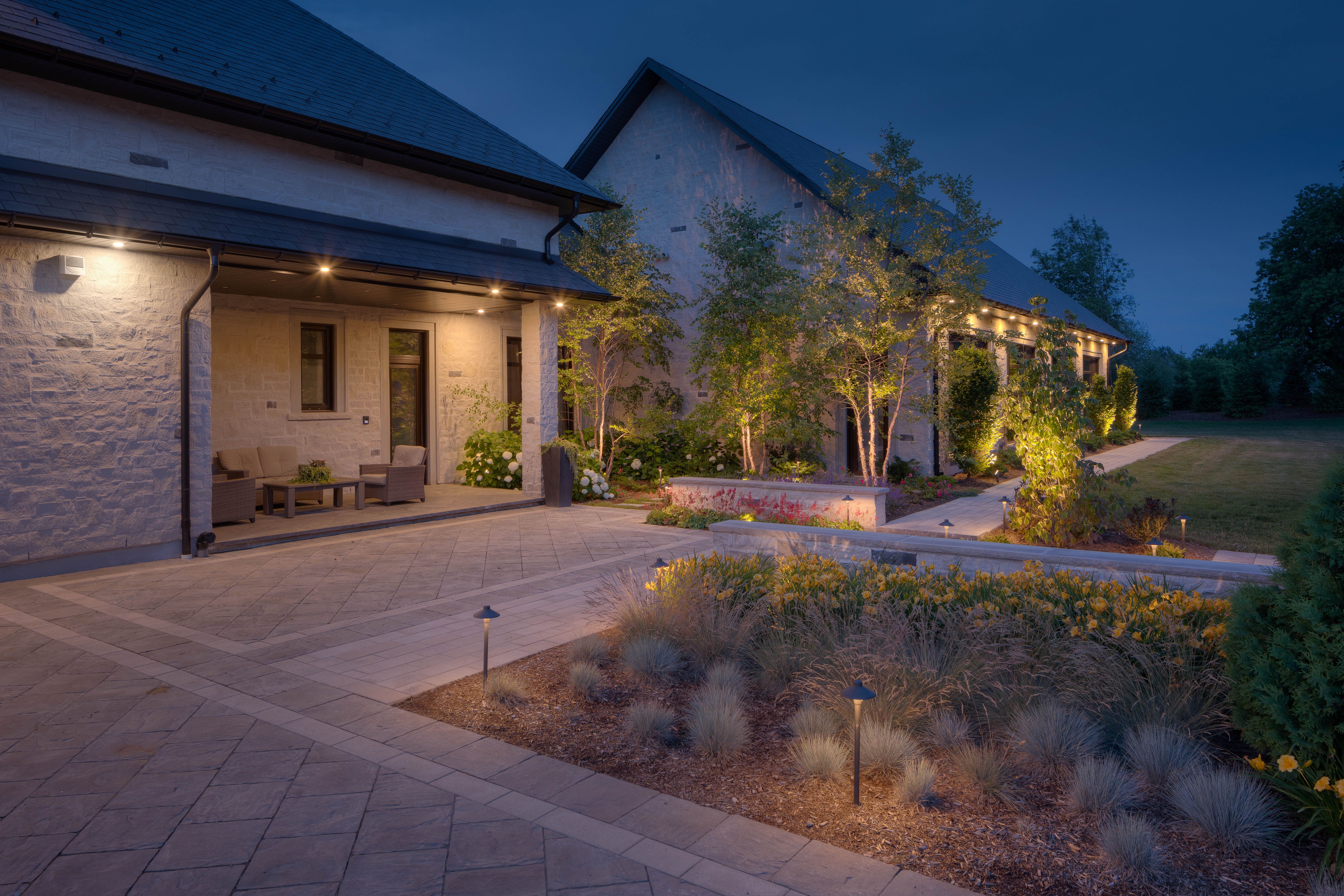 Kember project evening front entry lighting by Headwaters Landscape Design & Construction