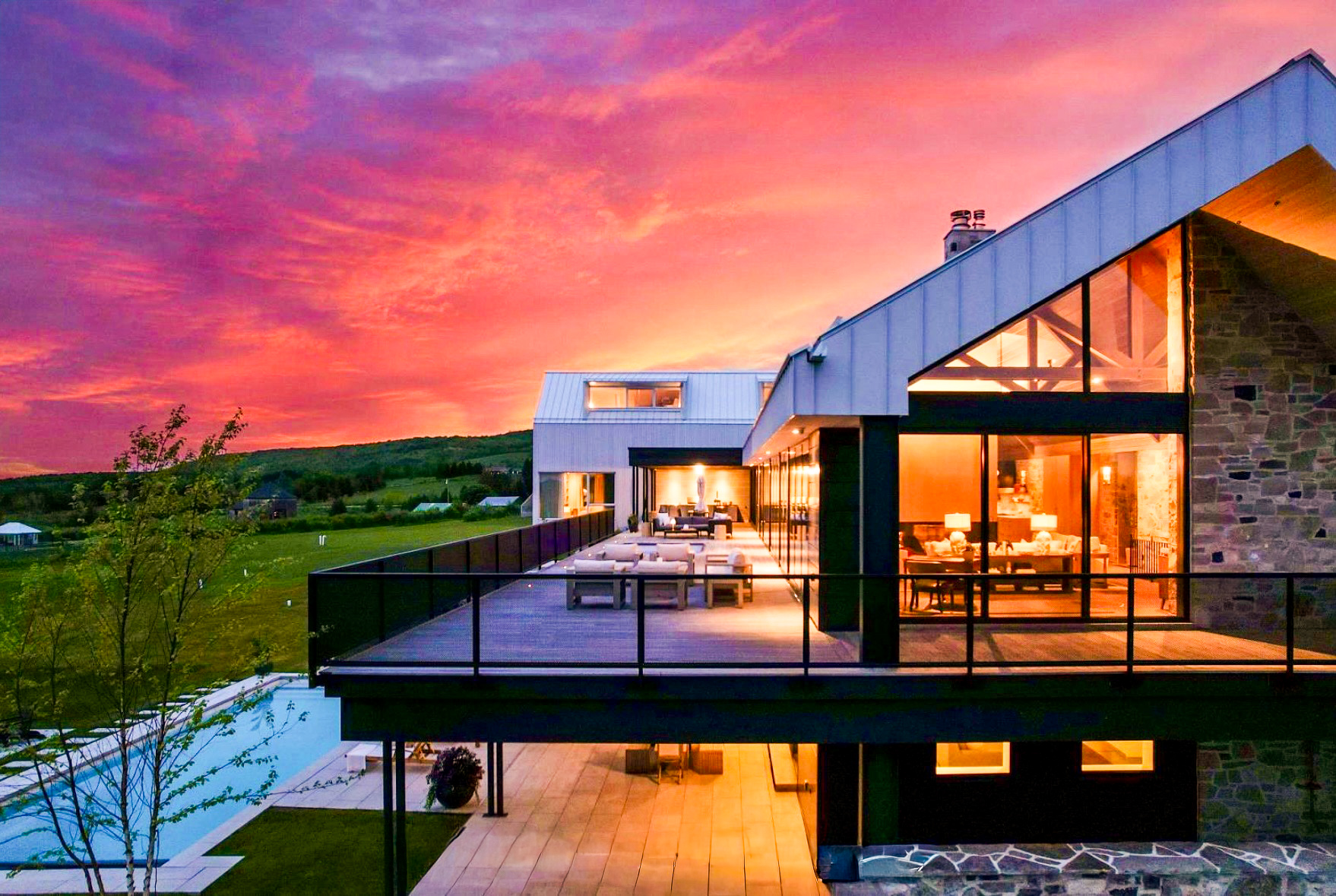 High-end residential landscape construction with modern outdoor living by Headwaters Landscape Design & Construction